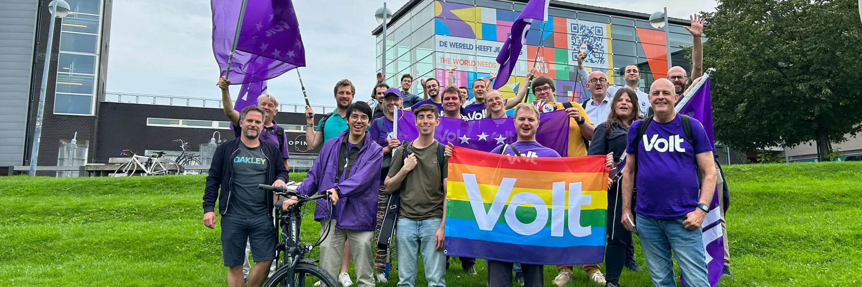 Group of Volters with flags and bikes in Brussels VUB
